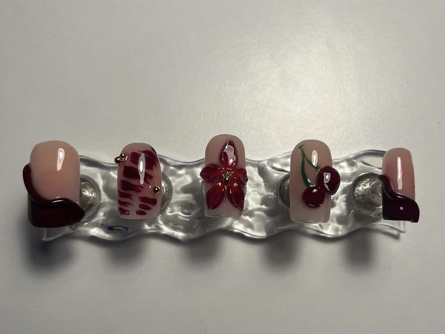 Press-on short square set with burgundy french tips, painted cherries and a 3D flower
